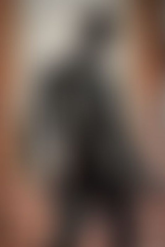 A sexy photograph of Cam Damage in black latex. Posted March 2018.