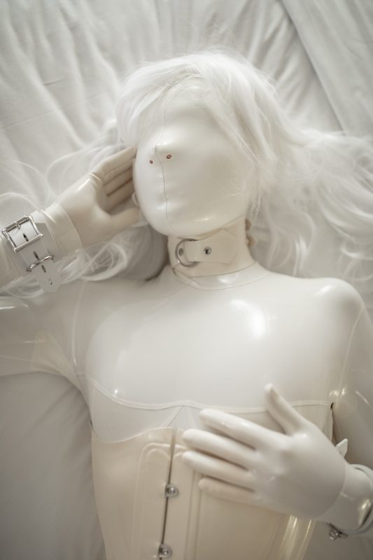 A sexy photograph of Nico, in white latex. Posted September 2018.