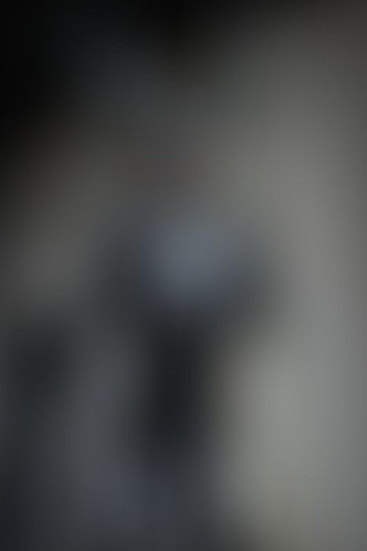 A sexy photograph of Cam Damage in black latex. Posted July 2021.