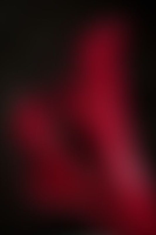 A sexy photograph of Knotasha in red latex. Posted November 2017.
