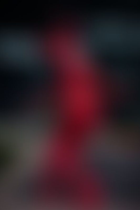 A sexy photograph of Ravyn Alexa in red latex. Tagged with: in public. Posted August 2021.