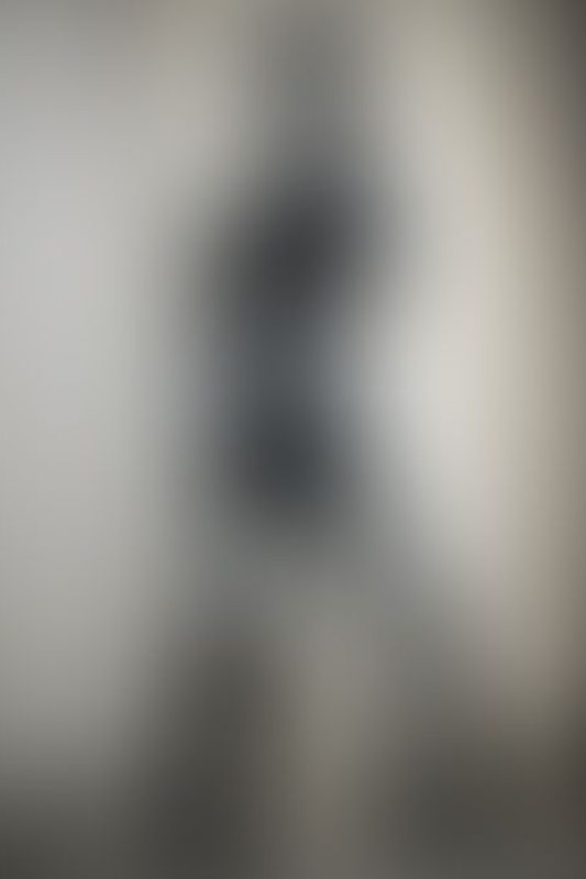 A sexy photograph of Charlee in black latex. Posted July 2021.