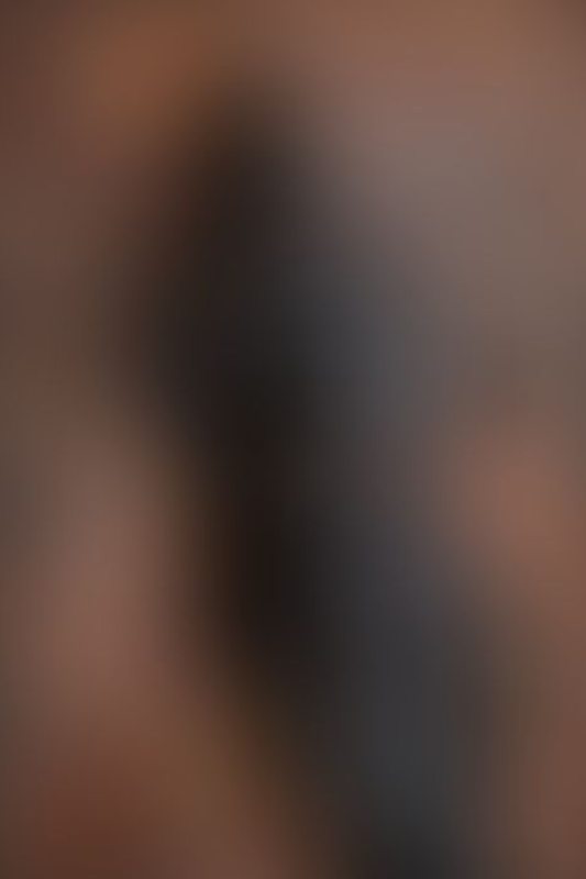 A sexy photograph of Emma Magnolia in black latex. Posted January 2026.