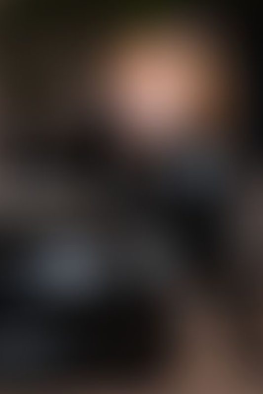 A sexy photograph of Emma Magnolia in black latex. Posted January 2026.