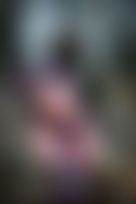 A sexy photograph of Glossy Toy in purple & pink &amp; transparent latex. Tagged with: in public &amp; moto helmet. Posted January 2020.