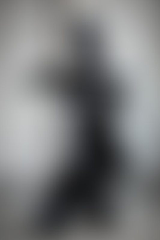 A sexy photograph of Glossy Toy in black latex. Posted July 2020.
