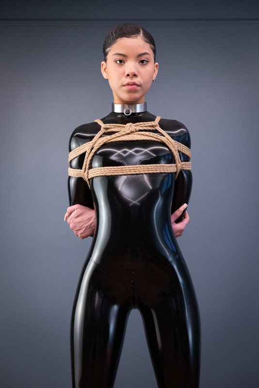A sexy photograph of Shweetie & Tie Rope Take Photo in black latex. Tagged with: rope / shibari. Posted December 2021.