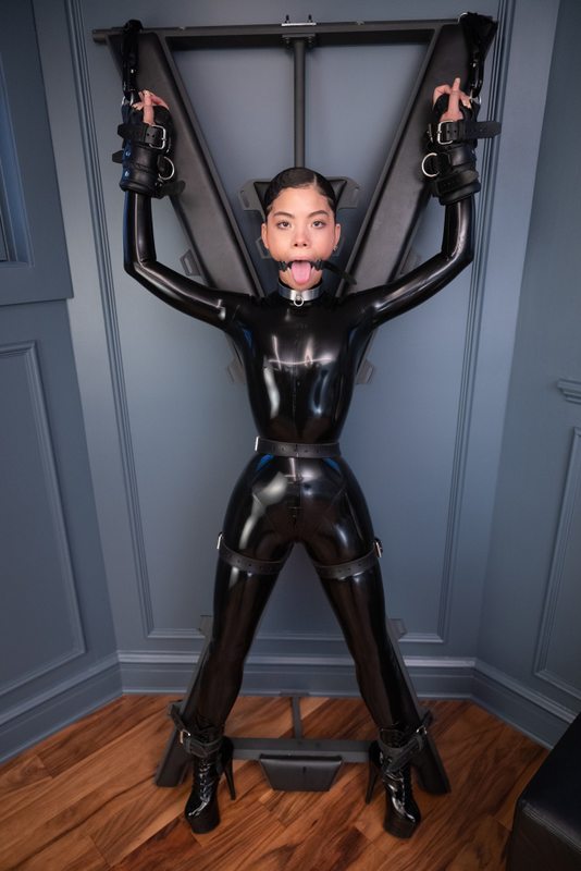A sexy photograph of Shweetie in black latex. Tagged with: gagged. Posted December 2021.