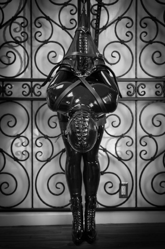 A sexy photograph of Vespa in black latex. Tagged with: armbinder. Posted November 2014.