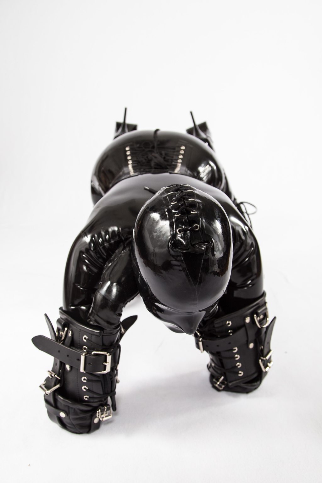 Gimps and Ballhoods A photo album of Vespa, in black latex. Tagged with: bitchsuit, inflatable & armbinder. Posted March 2015.