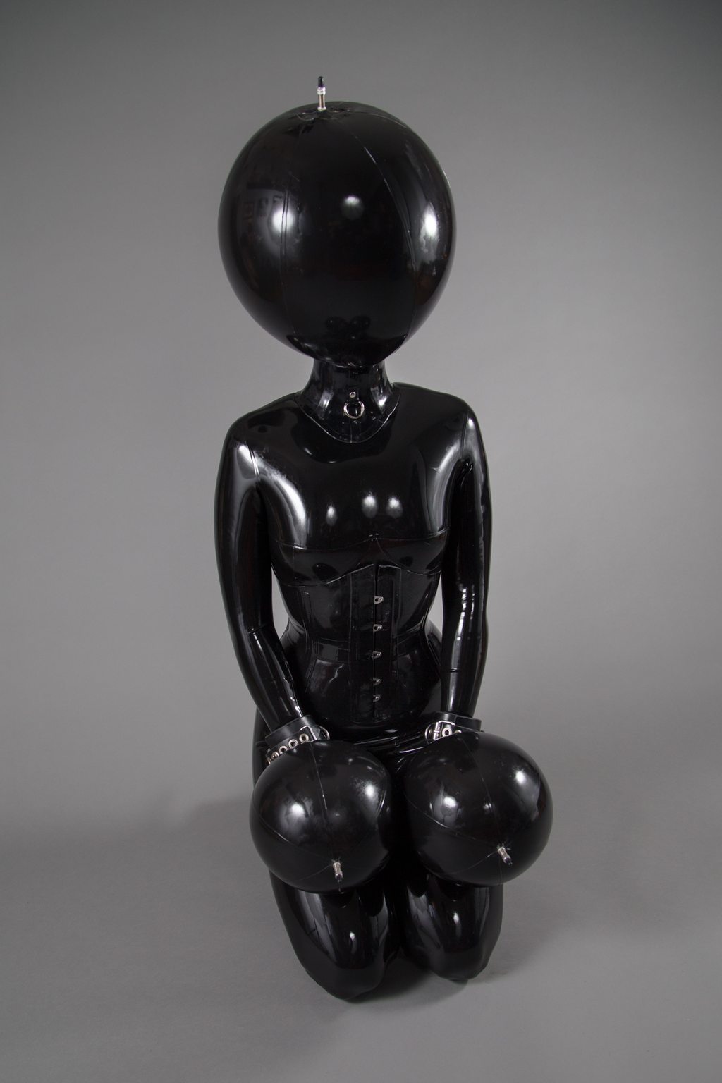 Gimps and Ballhoods A photo album of Vespa, in black latex. Tagged with: bitchsuit, inflatable & armbinder. Posted March 2015.