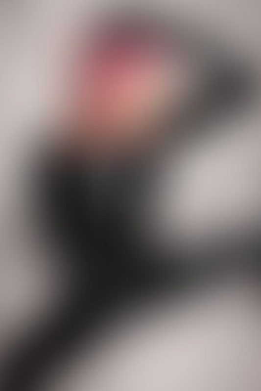 A sexy photograph of black latex. Posted July 2021.