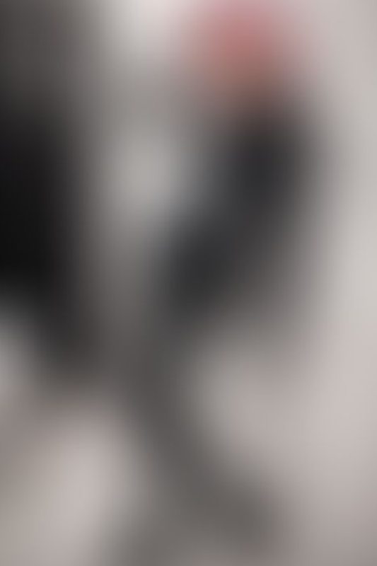 A sexy photograph of black latex. Posted July 2021.