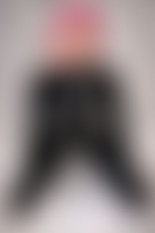 A sexy photograph of black latex. Posted July 2021.