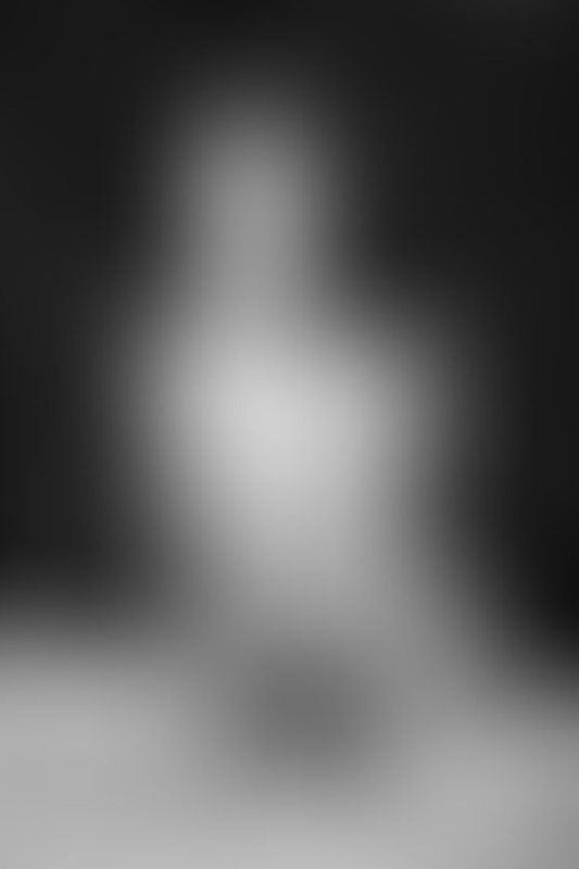 A sexy photograph of Goth Charlotte showing bare skin. Posted January 2023.