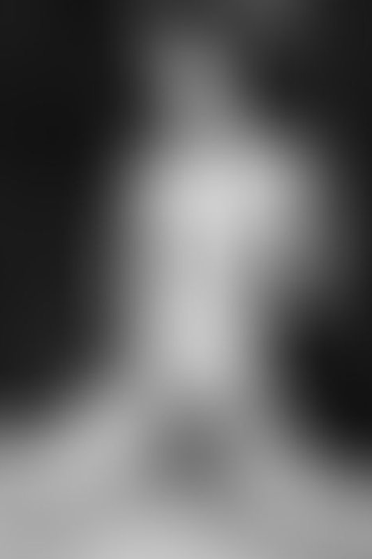 A sexy photograph of Goth Charlotte showing bare skin. Posted January 2023.