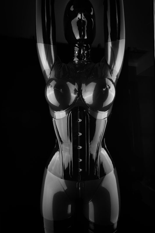 A sexy photograph of Vespa in metallic latex. Posted December 2015.