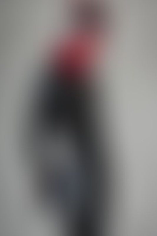 A sexy photograph of Cam Damage in black latex. Posted May 2022.