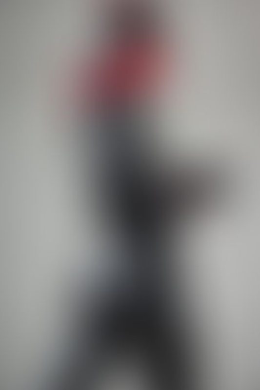 A sexy photograph of Cam Damage in black latex. Posted May 2022.
