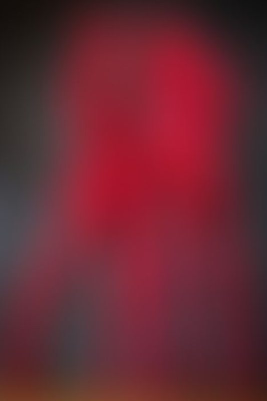A sexy photograph of Cam Damage &amp; Vespa in red latex. Posted April 2021.