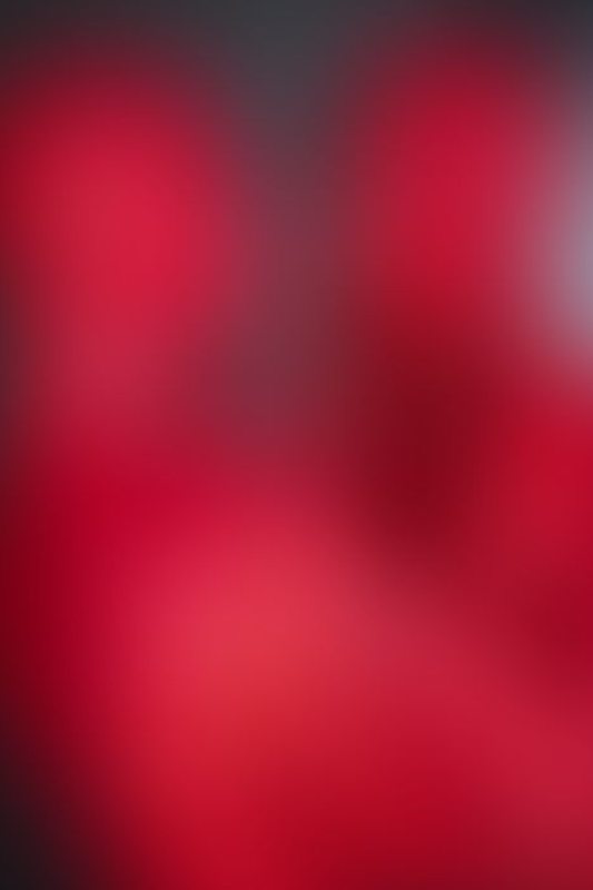 A sexy photograph of Cam Damage &amp; Vespa in red latex. Posted April 2021.
