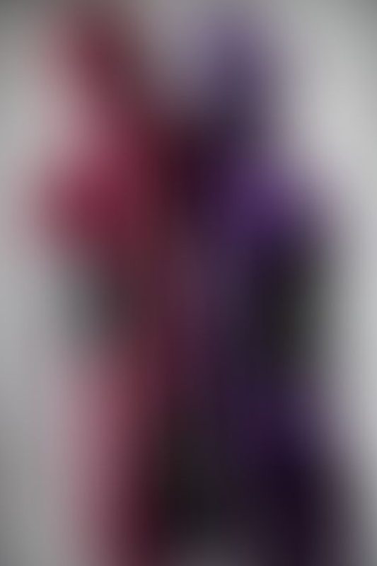 A sexy photograph of Vespa &amp; Ms Pervology in purple & pink &amp; red latex. Tagged with: rubber kitten. Posted November 2015.