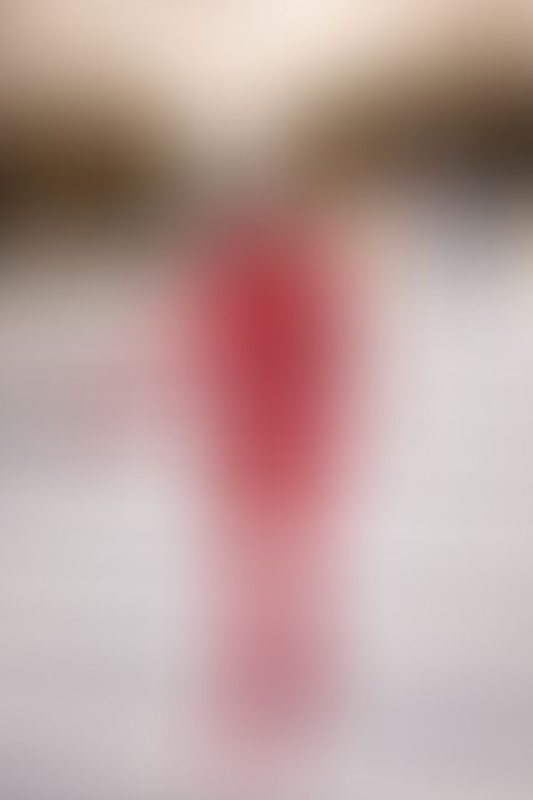 A sexy photograph of Awlivv in red latex. Tagged with: in public. Posted June 2025.