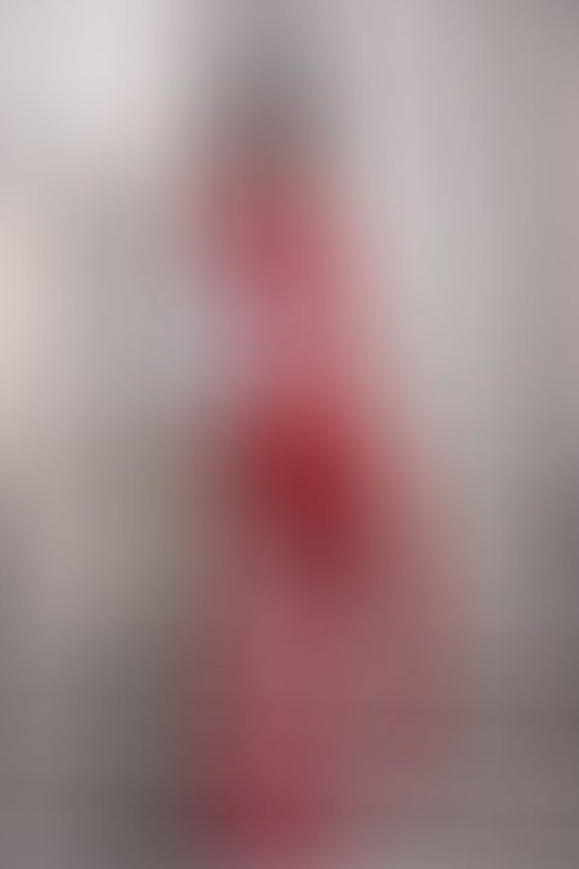 A sexy photograph of Awlivv in red latex. Tagged with: in public. Posted June 2025.