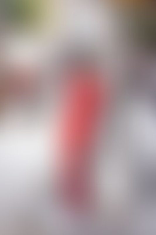 A sexy photograph of Awlivv in red latex. Tagged with: in public. Posted June 2025.