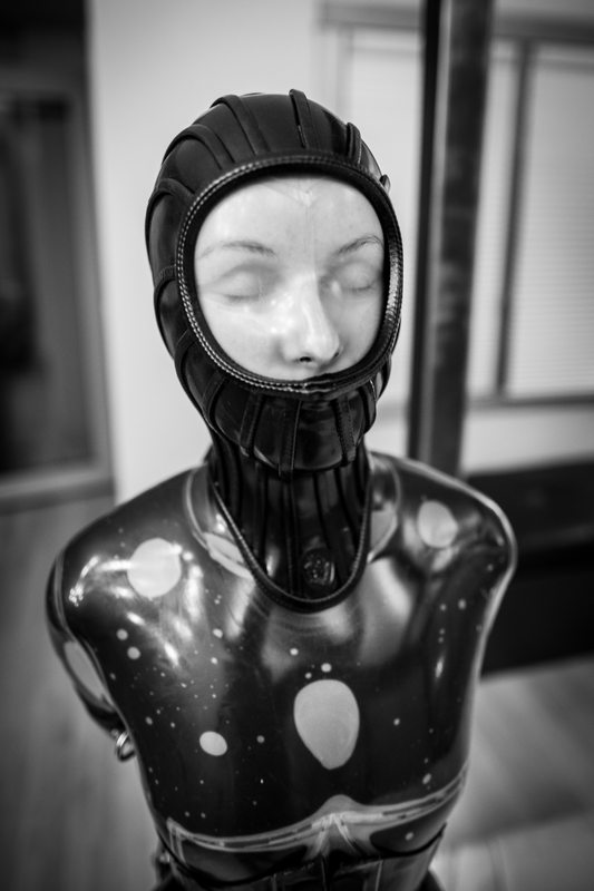 A sexy photograph of Vespa in black & transparent latex. Tagged with: neck corset. Posted April 2016.