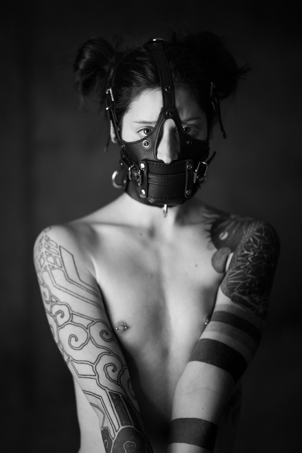 Leatherboi A photo album of Cam Damage. Tagged with: leather, tattoos, muzzle & armbinder. Posted February 2019.