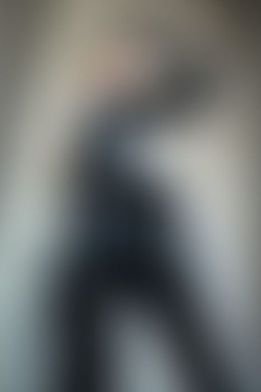 A sexy photograph of Skin & Sin in black latex. Posted July 2020.