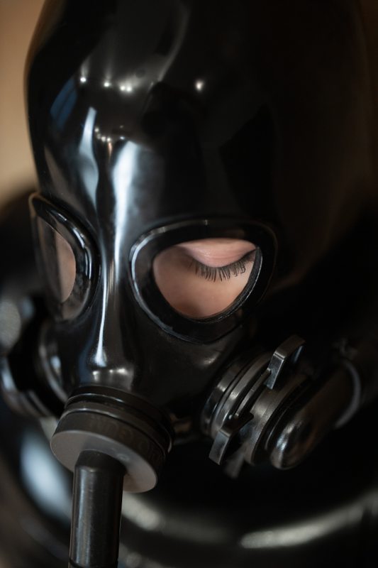 A photo album of Mbot in black latex. Tagged with: gasmask & breath play. Posted March 2018.
