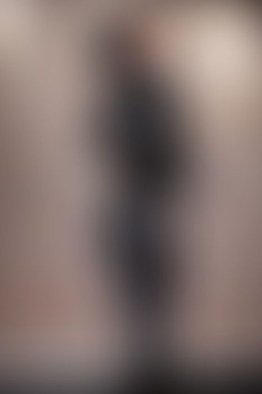 A sexy photograph of Minx in black latex. Posted November 2025.