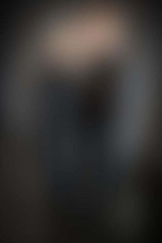 A sexy photograph of Cam Damage &amp; Mbot in black latex. Posted July 2021.