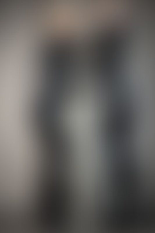 A sexy photograph of Cam Damage &amp; Mbot in black latex. Posted July 2021.