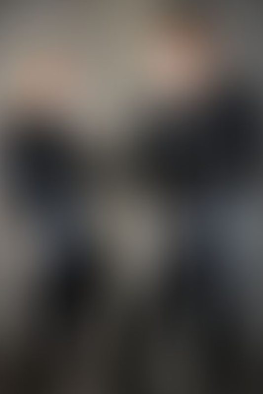 A sexy photograph of Cam Damage &amp; Mbot in black latex. Posted July 2021.