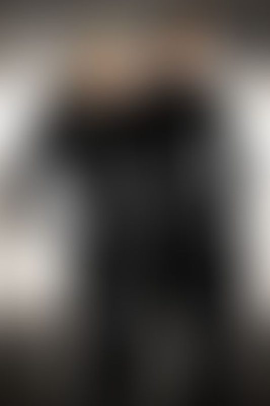 A sexy photograph of Cam Damage &amp; Mbot in black latex. Posted July 2021.