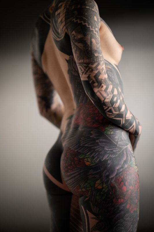 A sexy photograph of Fire Rabbit, showing bare skin. Tagged with: tattoos. Posted April 2020.