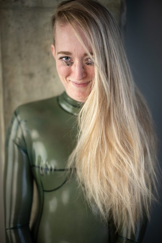 A sexy photograph of Charlee, in transparent latex. Posted September 2021.
