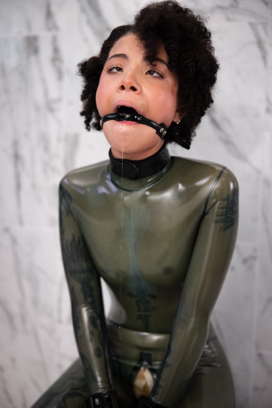 A photo album of Shweetie in transparent latex. Tagged with: gagged & drool. Posted May 2022.