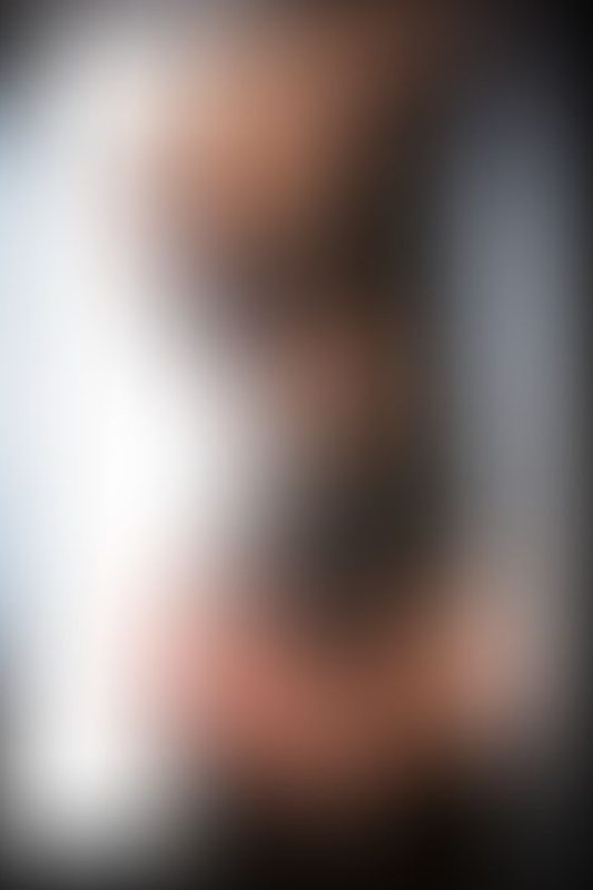 A sexy photograph of Opal Snow showing bare skin with black latex. Posted February 2017.