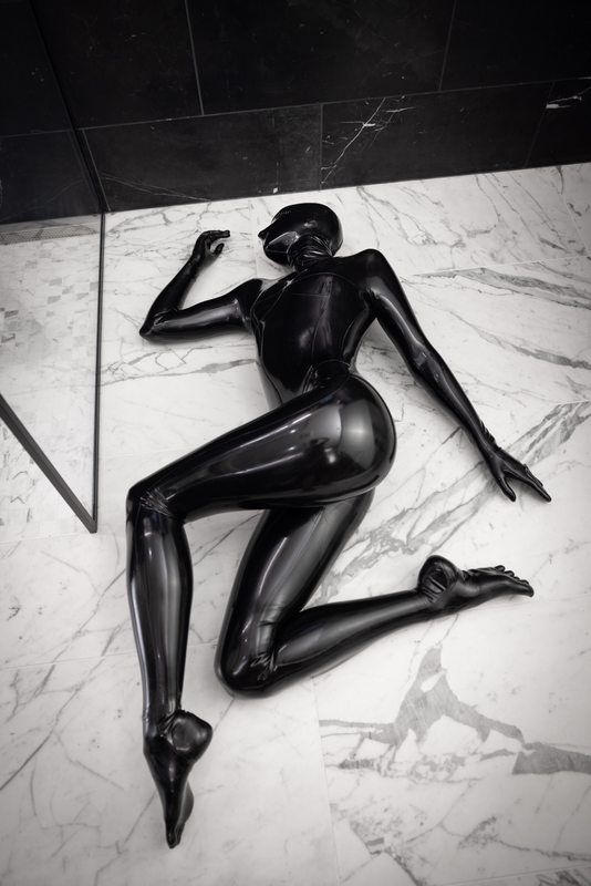 A sexy photograph of Vespa in black latex. Posted October 2021.
