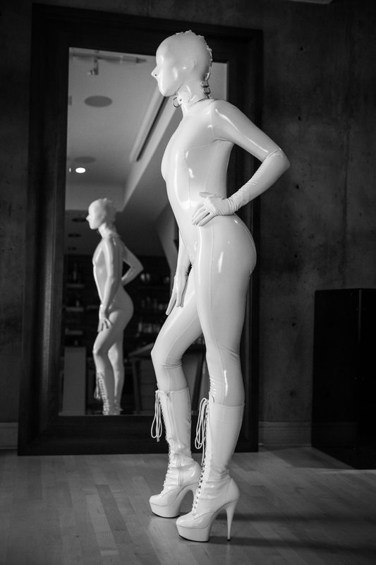 A sexy photograph of Vespa, in white latex. Posted May 2018.