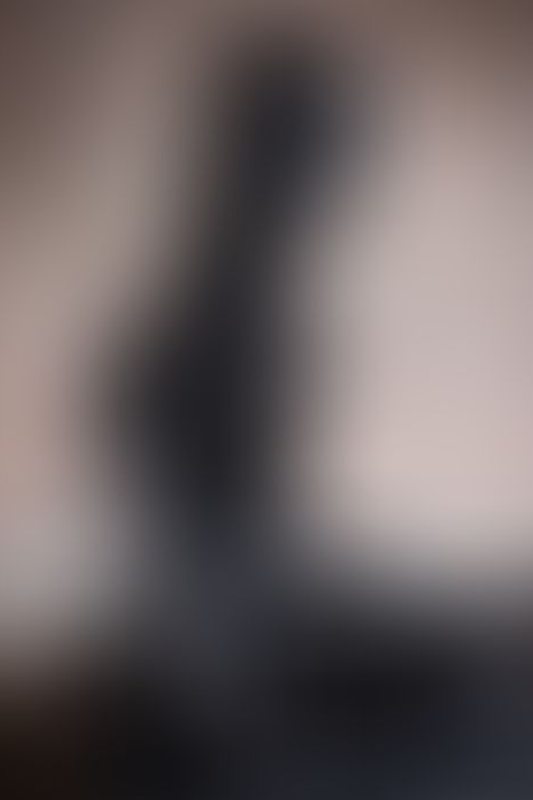A sexy photograph of Awlivv in black latex. Tagged with: armbinder. Posted September 2025.