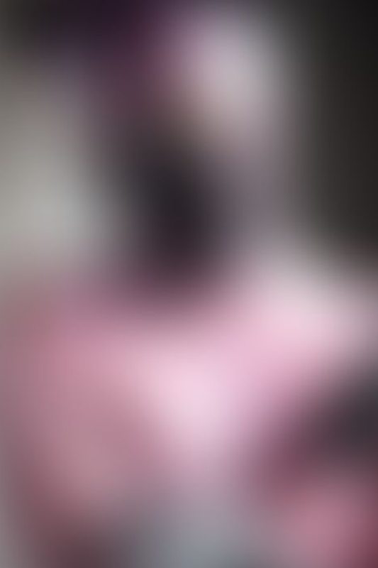 A sexy photograph of Glossy Toy in transparent &amp; purple & pink latex. Tagged with: rubber kitten. Posted April 2020.