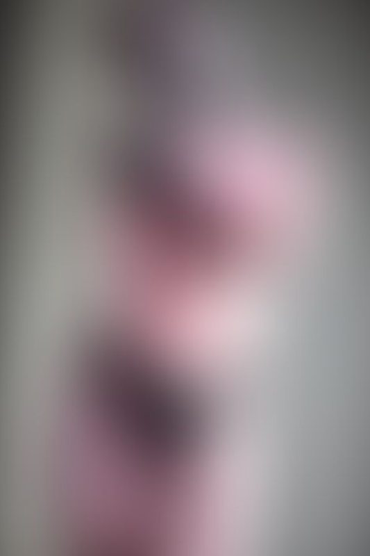 A sexy photograph of Glossy Toy in transparent &amp; purple & pink latex. Tagged with: rubber kitten. Posted April 2020.