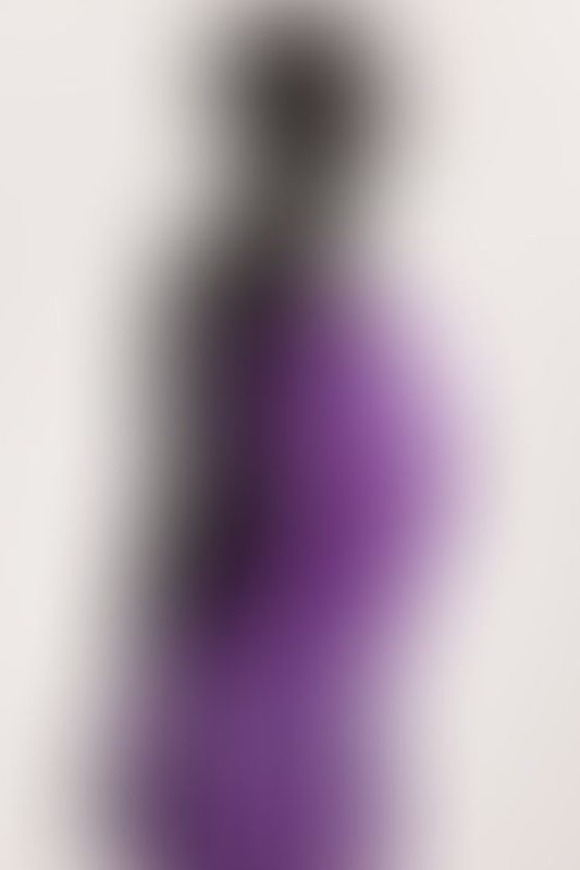 A sexy photograph of Cam Damage in purple & pink latex. Tagged with: gags &amp; armbinder. Posted March 2018.