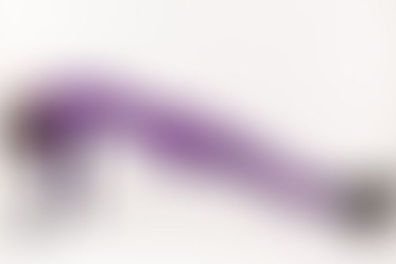 A sexy photograph of Cam Damage in purple & pink latex. Posted March 2018.