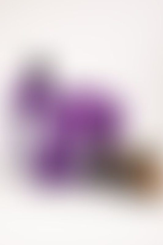 A sexy photograph of Cam Damage in purple & pink latex. Posted March 2018.